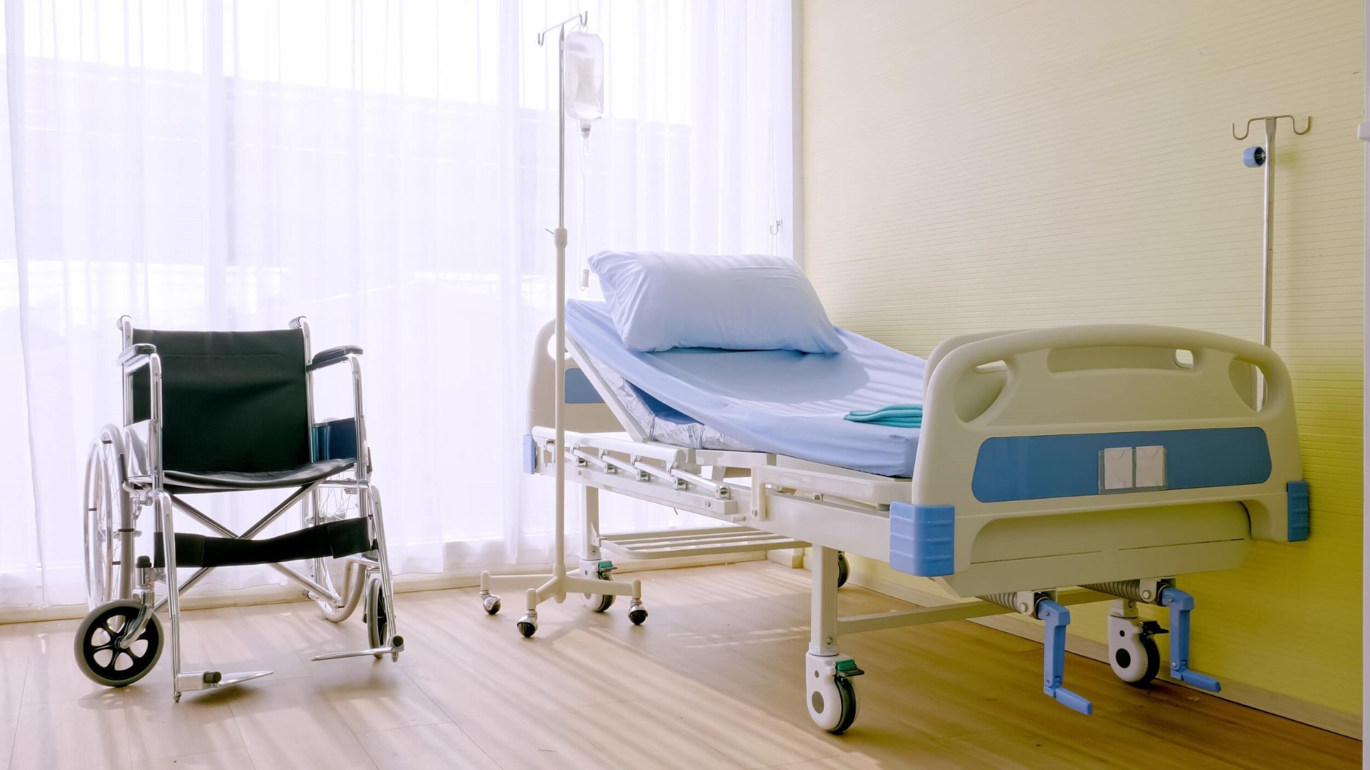 hospital-bed-and-wheelchair-at-hospital-room-2021-09-03-19-40-56-utc-Custom-Custom.jpg